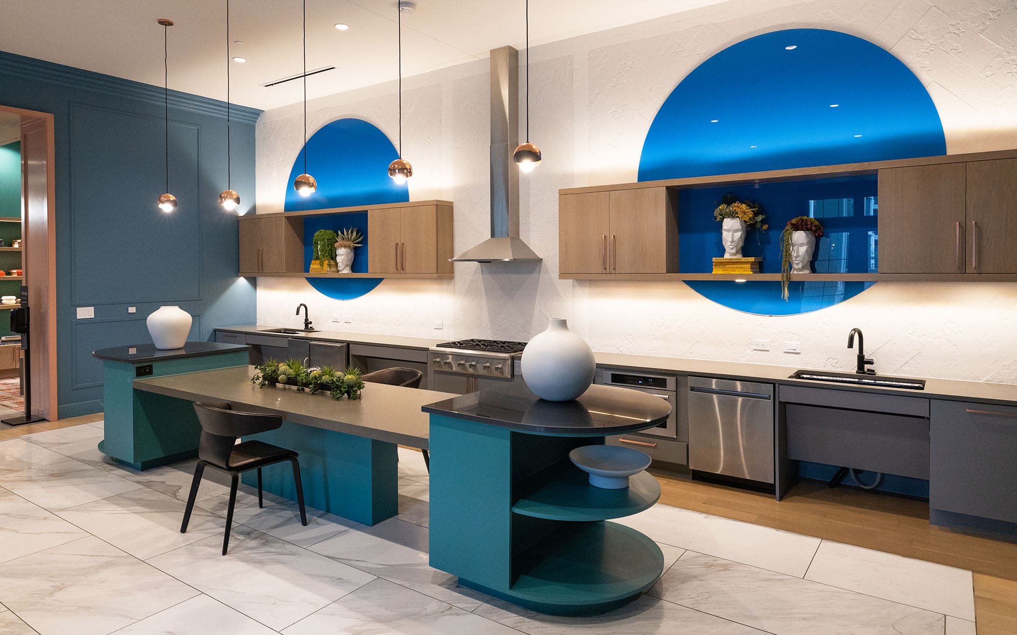 Dreamwalls blue backpainted glass circles at The Margo Apartments in TX-01